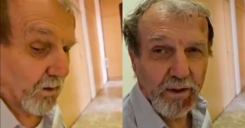 Juraj Cintula videóban balra előre lefelé néz, jobbra a kamera felé. Ősz körszakálla van, világos inget hord.